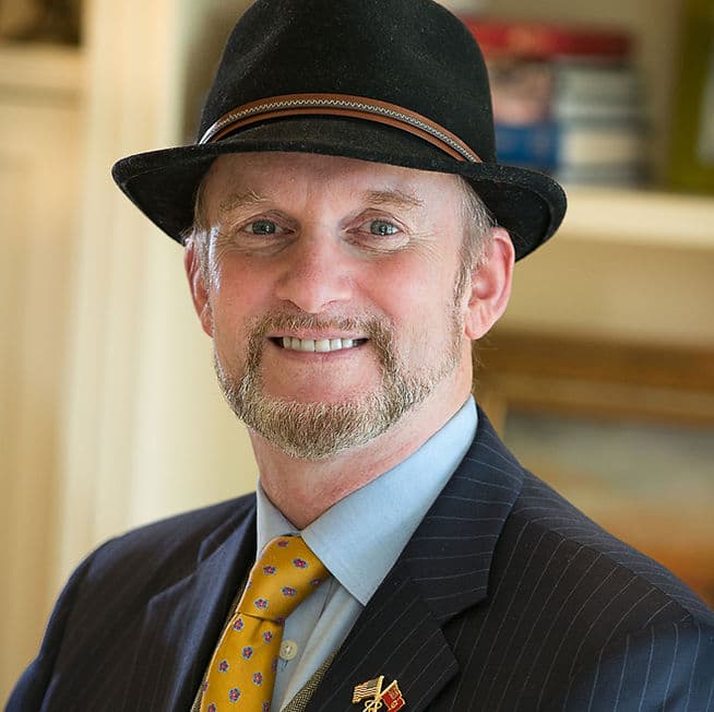 Gregory W. Slayton, Chairman of the Board of Cogito AI